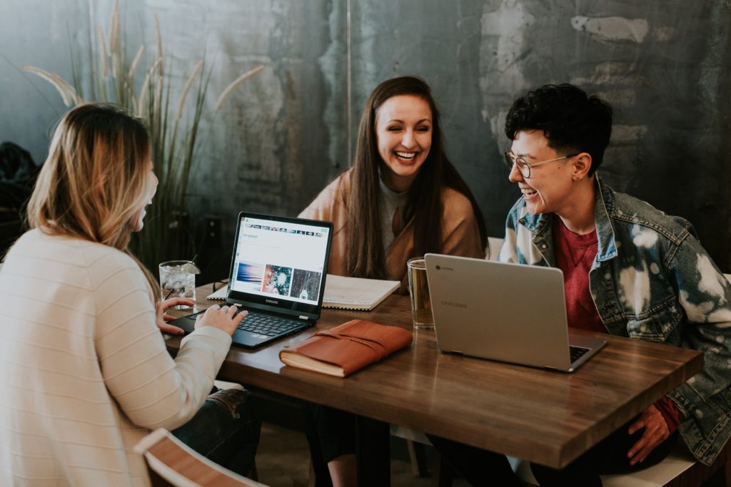 people laughing at table